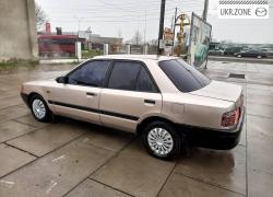 Седан Mazda 323 1994 в Хусте