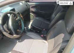 Седан Mitsubishi Carisma I Рестайлинг 2003 в Снятыне